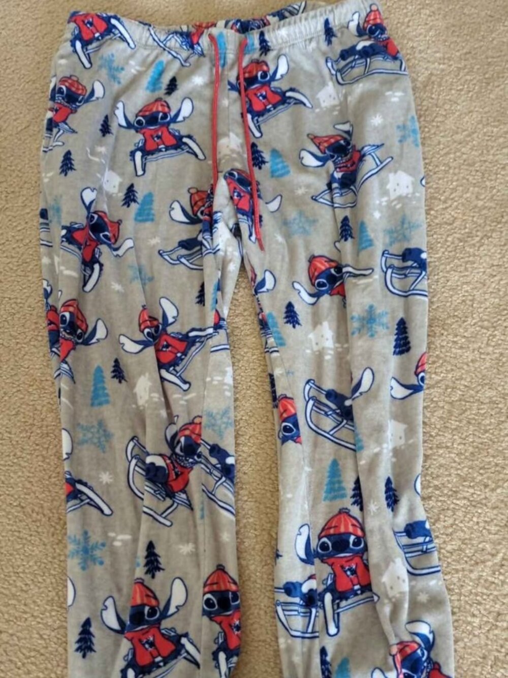Disney "stitch" pajama pants size L 12/14